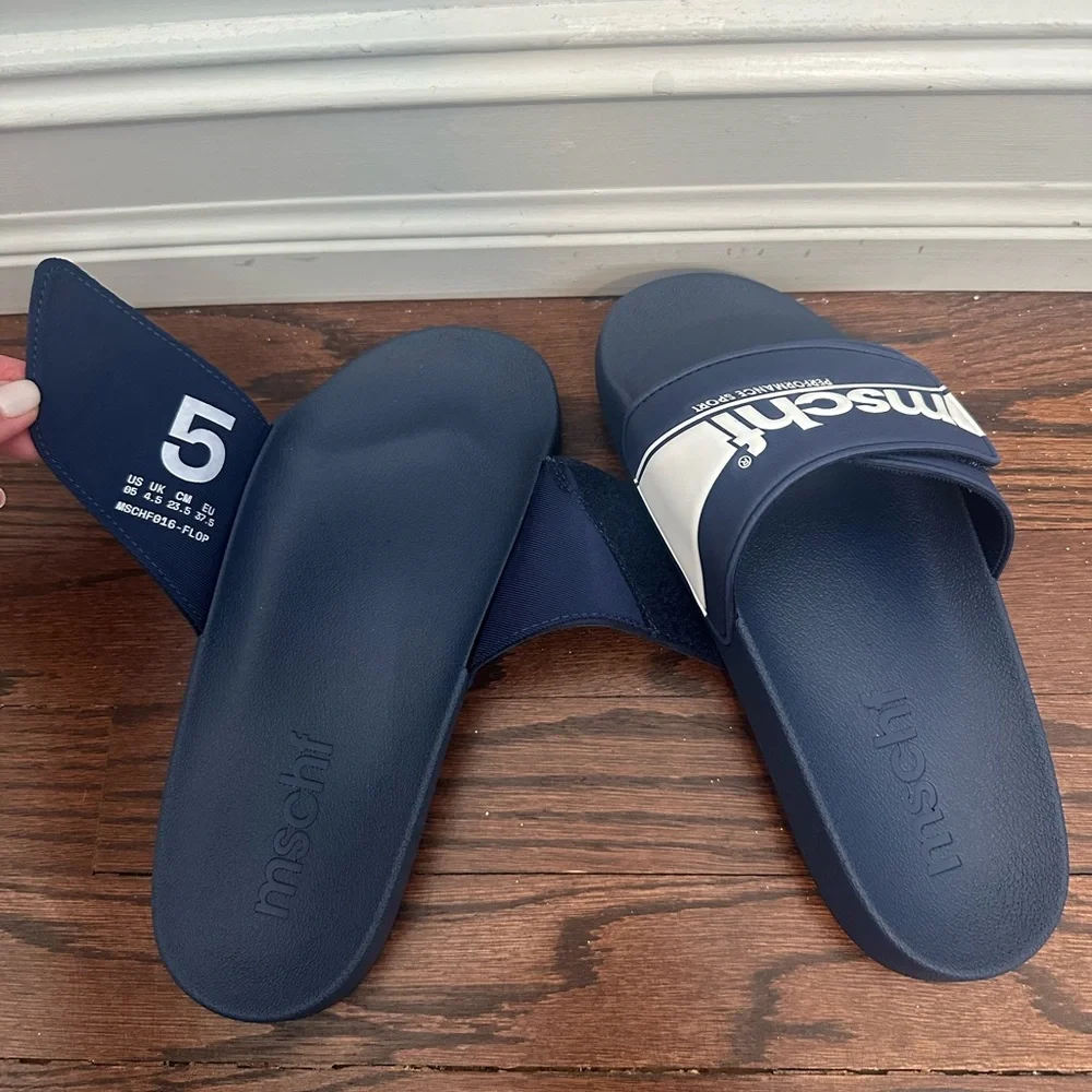New With Tags (NWT) MSCHF Navy and White Slides